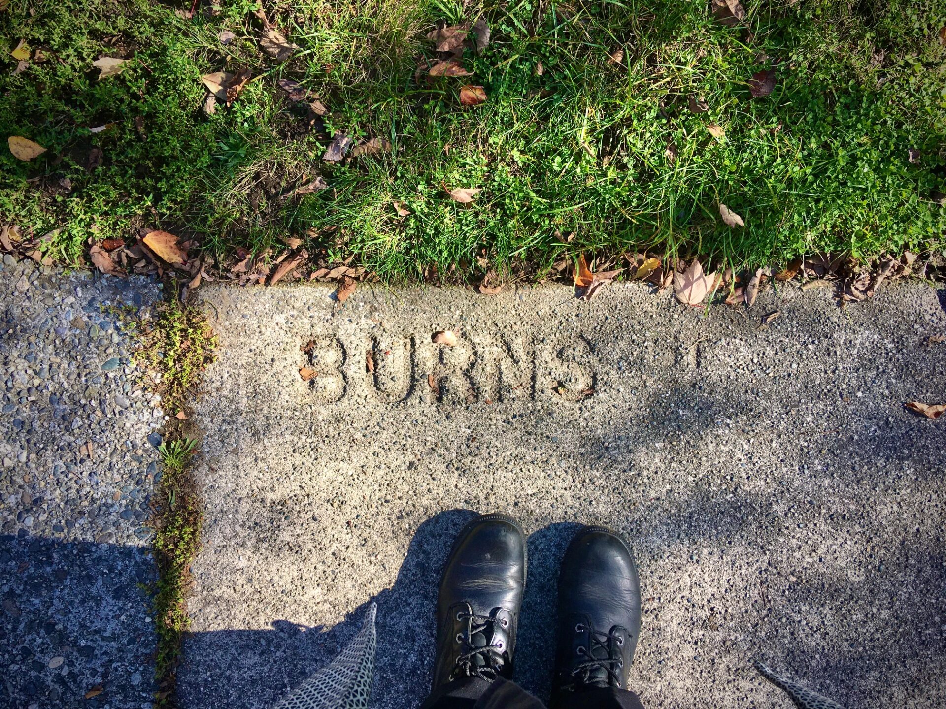Summer walking tours with VHF - Secrets of mount Pleasant - photo of "Burns" engraved on a walkway.
